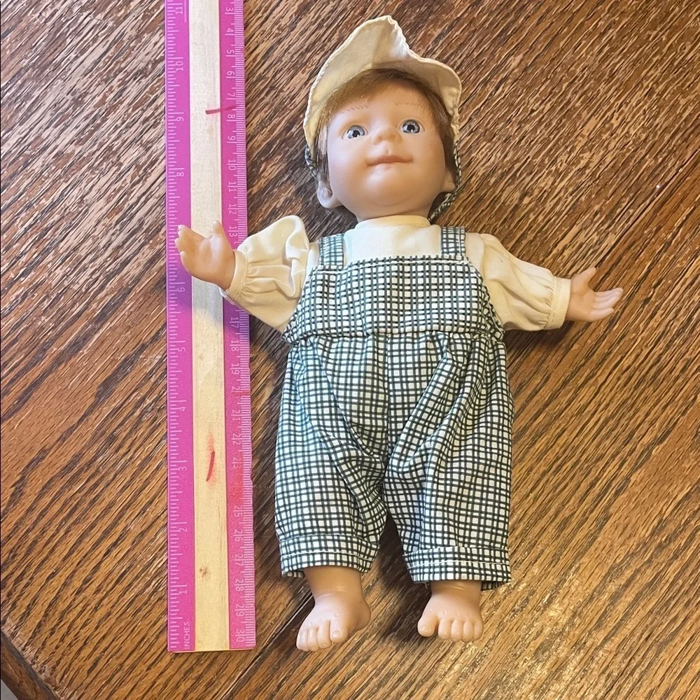Adorable Baby Doll with Checkered Overalls